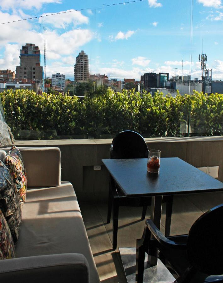 Hotel 100 Luxury Suites By Preferred Bogota Bagian luar foto A balcony in Mexico City