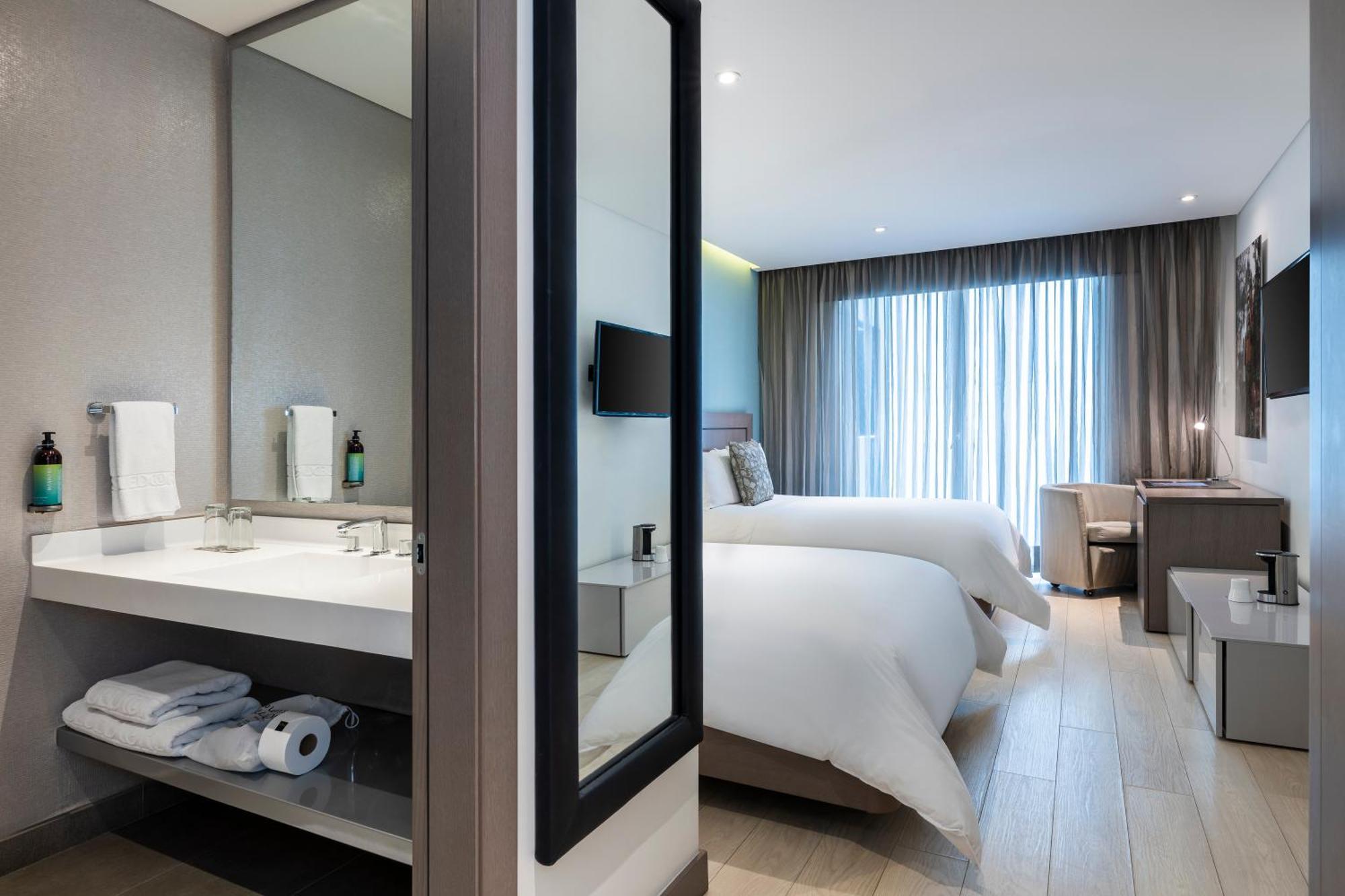 Hotel 100 Luxury Suites By Preferred Bogota Bagian luar foto Deluxe Room