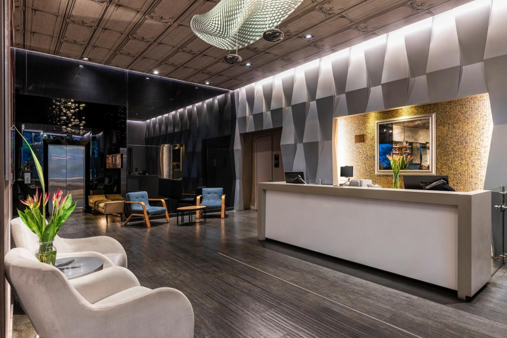 Hotel 100 Luxury Suites By Preferred Bogota Bagian luar foto The lobby of the hotel