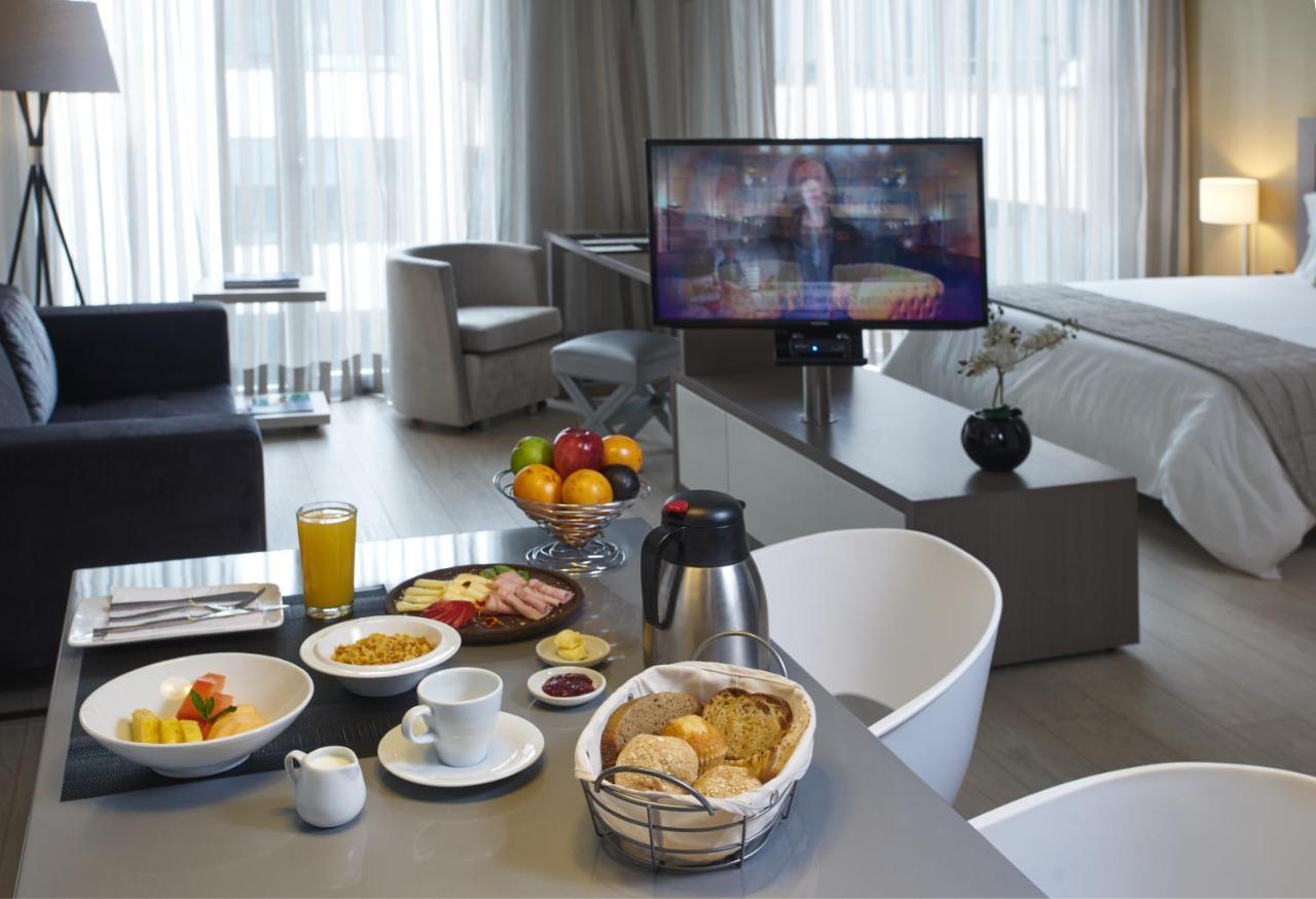 Hotel 100 Luxury Suites By Preferred Bogota Bagian luar foto A room at the hotel