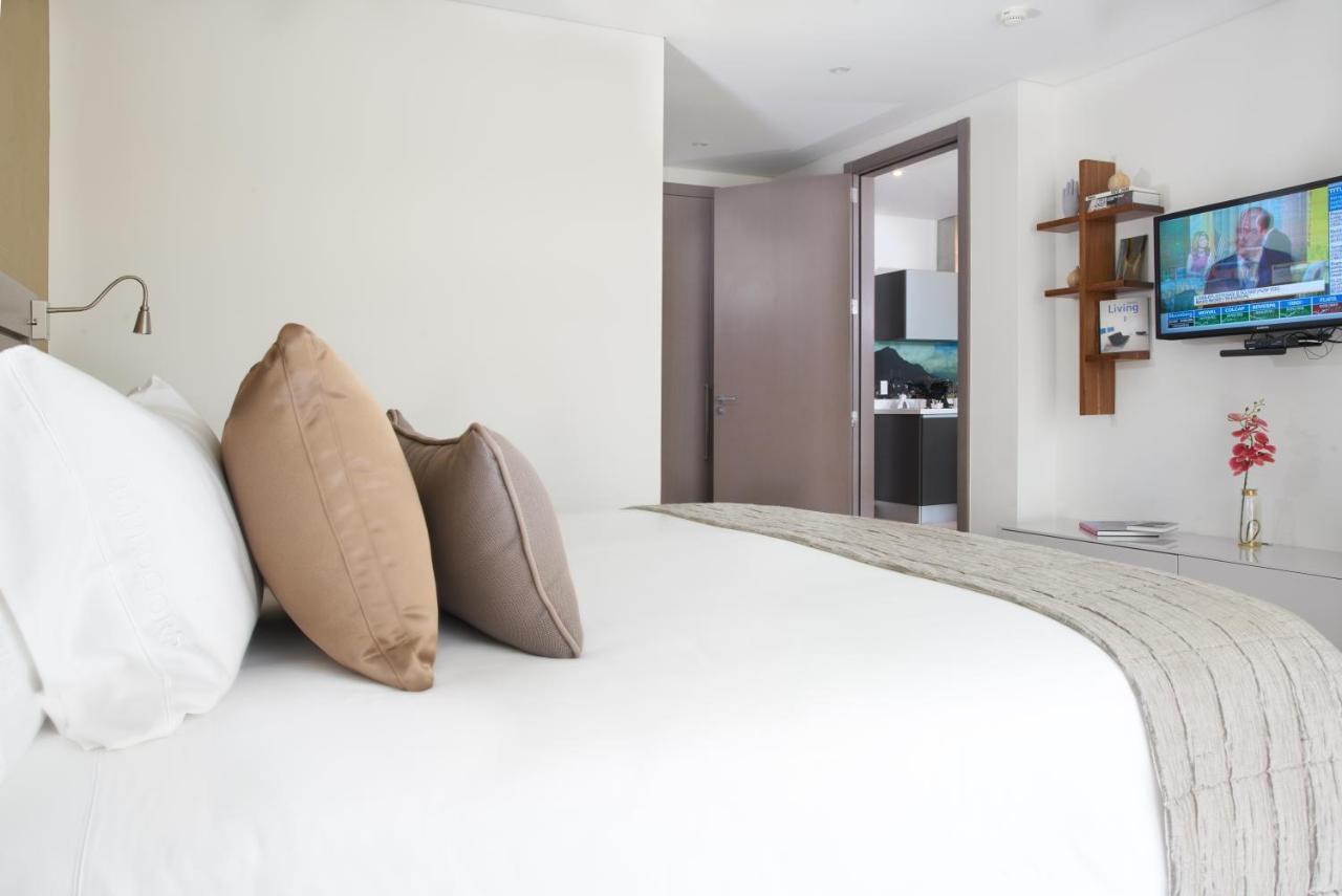 Hotel 100 Luxury Suites By Preferred Bogota Bagian luar foto A bedroom at the hotel